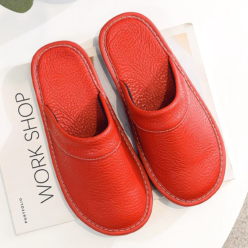 Step into comfort with these elegant leather slippers for women.
