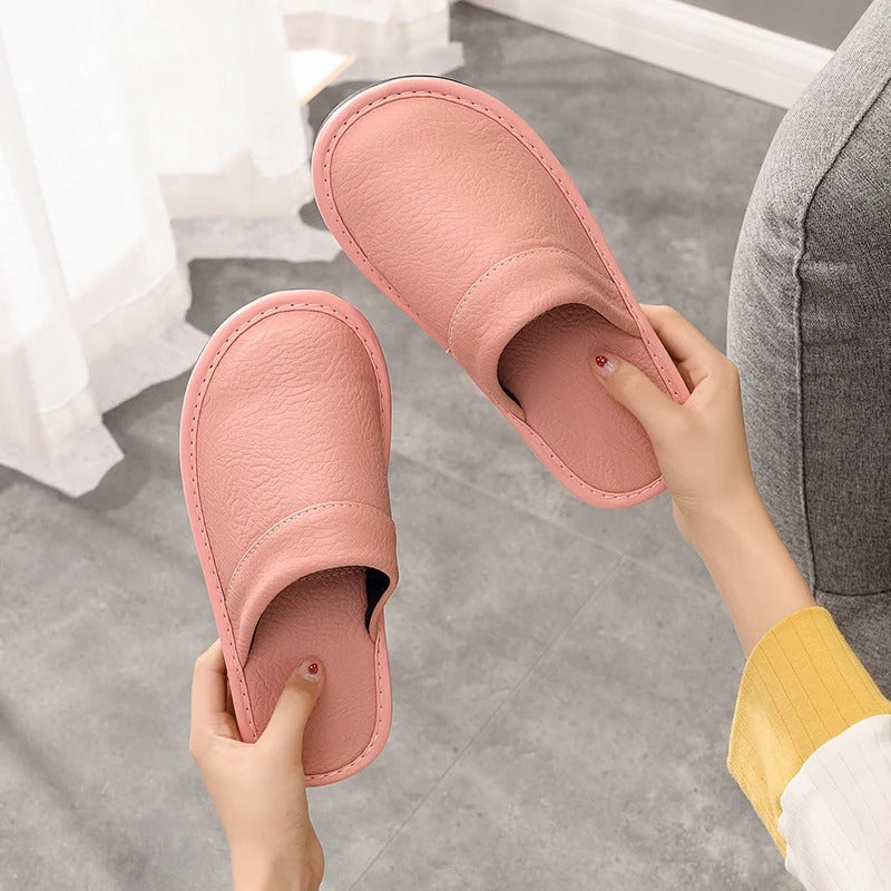 Durable and soft leather womens slippers, ideal for everyday home wear.