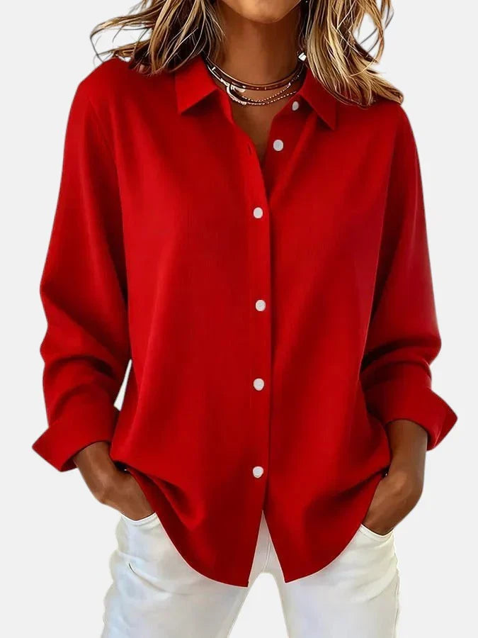 White women's button collar blouse. Elegant white shirt, perfect for office wear or a chic casual look.