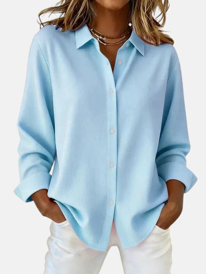Pink women's elegant button collar blouse. Stylish office wear top, versatile for a sophisticated casual look.
