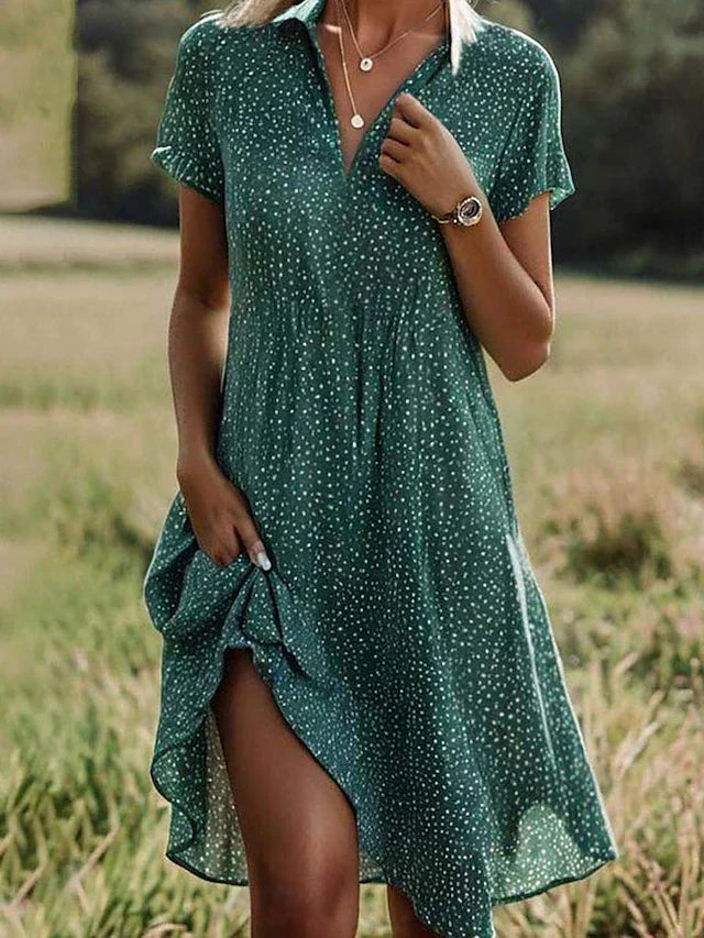 Women's elegant button-down midi shirt dress, perfect for versatile summer fashion. Features short sleeves & a flattering fit.