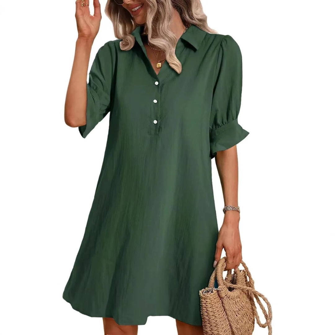 Women's relaxed fit shirt dress, button-down front, offering chic comfort for any casual outing.