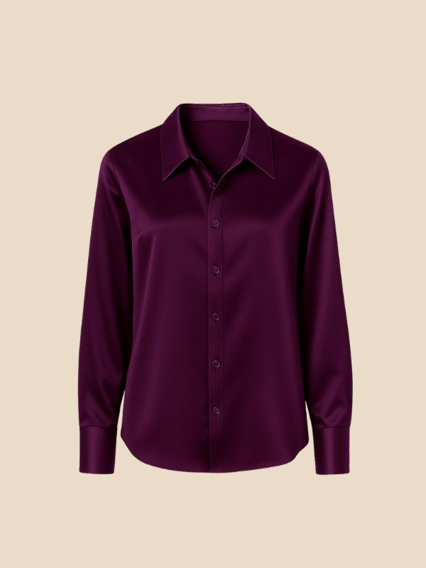 Classic white women's button-down shirt for office wear, pointed collar.