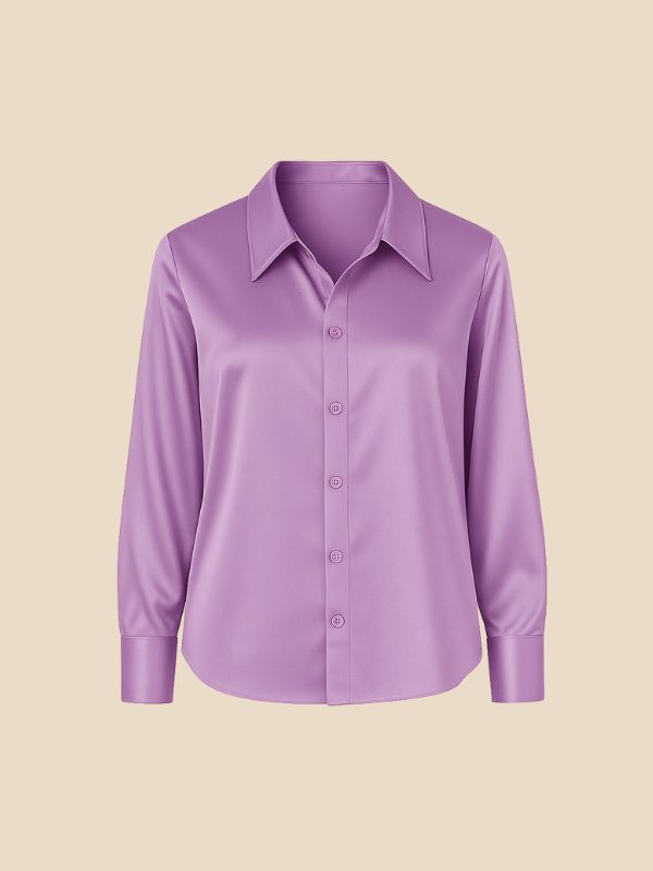 Striped women's button-down shirt, long sleeve, pointed collar, for smart casual looks.