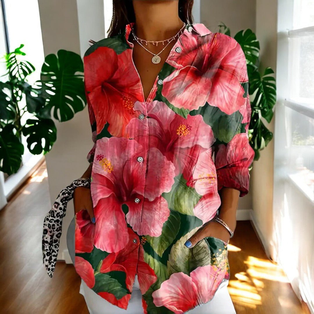 Women's elegant button-front blouse for everyday wear. Timeless long sleeve top with versatile style.