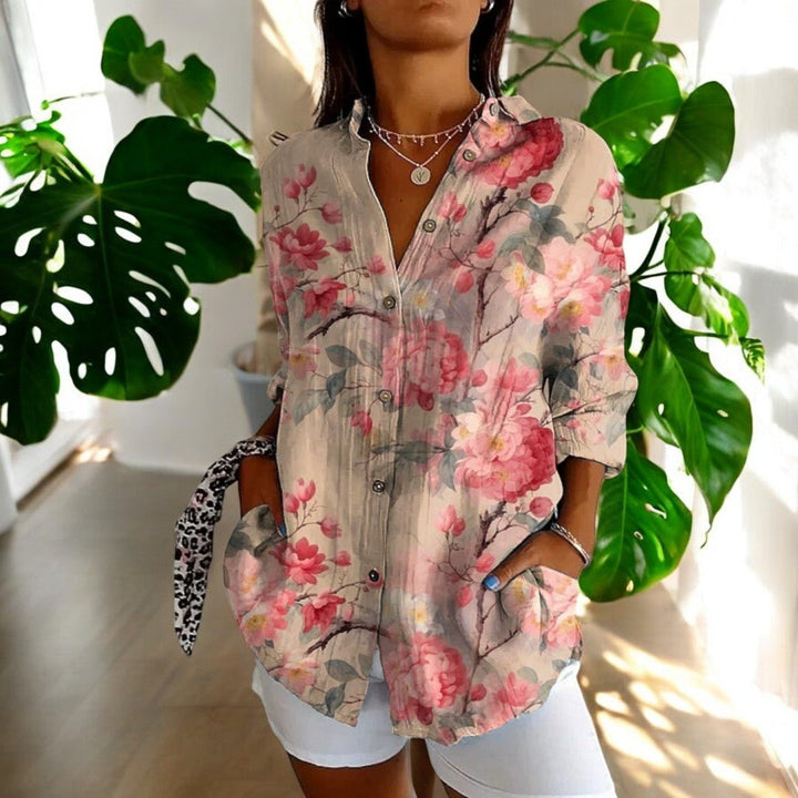 Floral print long sleeve women's blouse. Chic button-front top for versatile everyday, spring & summer fashion.