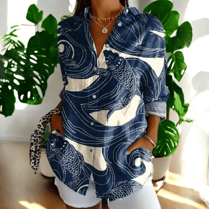 Solid color women's button-front blouse. Elegant everyday long sleeve top, versatile for workwear or casual chic.