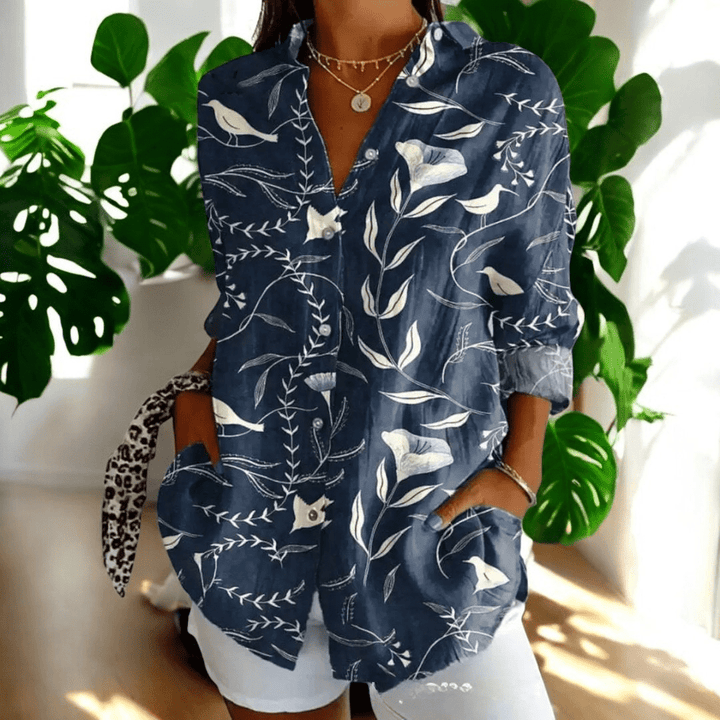 Timeless women's button-front blouse. Elegant long sleeve top for versatile everyday wear & chic fashion.