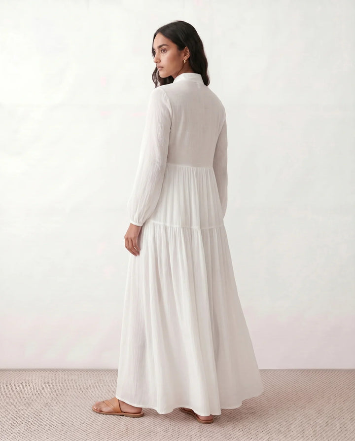 Casual women's button-front maxi sundress, comfortable and stylish for summer days or beach outings.