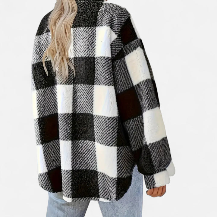 Elegant outerwear for women: a plush checkered jacket for cold weather.