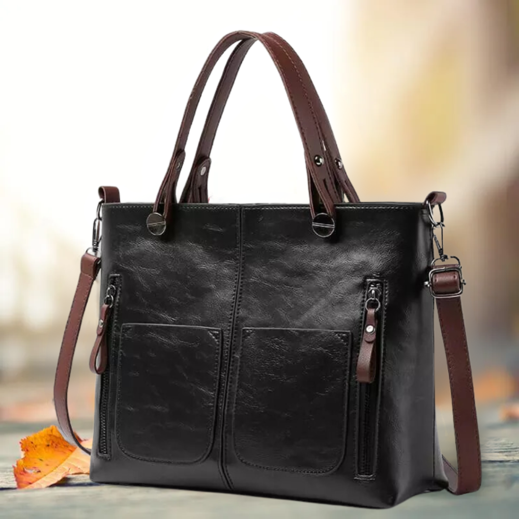 Close-up of premium leather texture on a women's classic shoulder bag, perfect for everyday use.