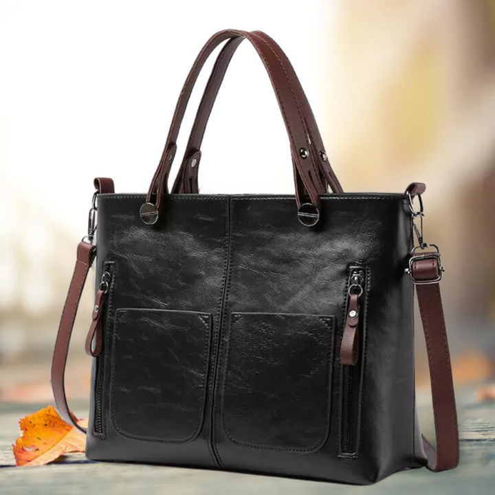 Close-up of premium leather texture on a women's classic shoulder bag, perfect for everyday use.