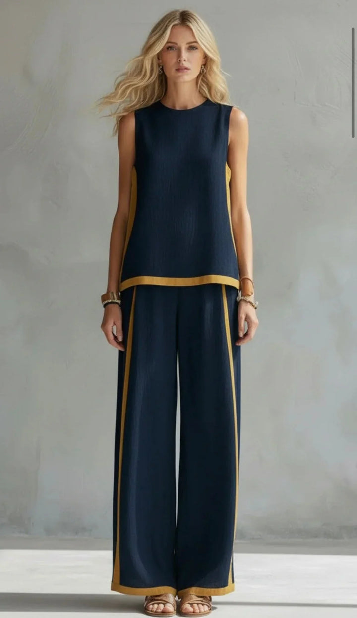 Fashionable women's contrast-trim sleeveless top & wide-leg pants set. A comfortable and versatile summer outfit.