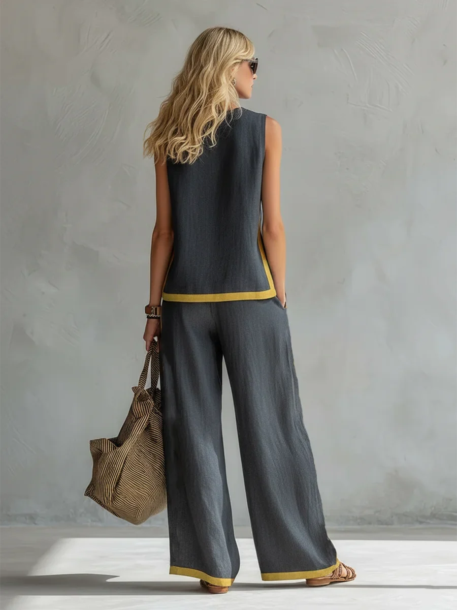 Elegant women's matching set featuring a contrast-trim sleeveless top & comfortable wide-leg pants for summer.