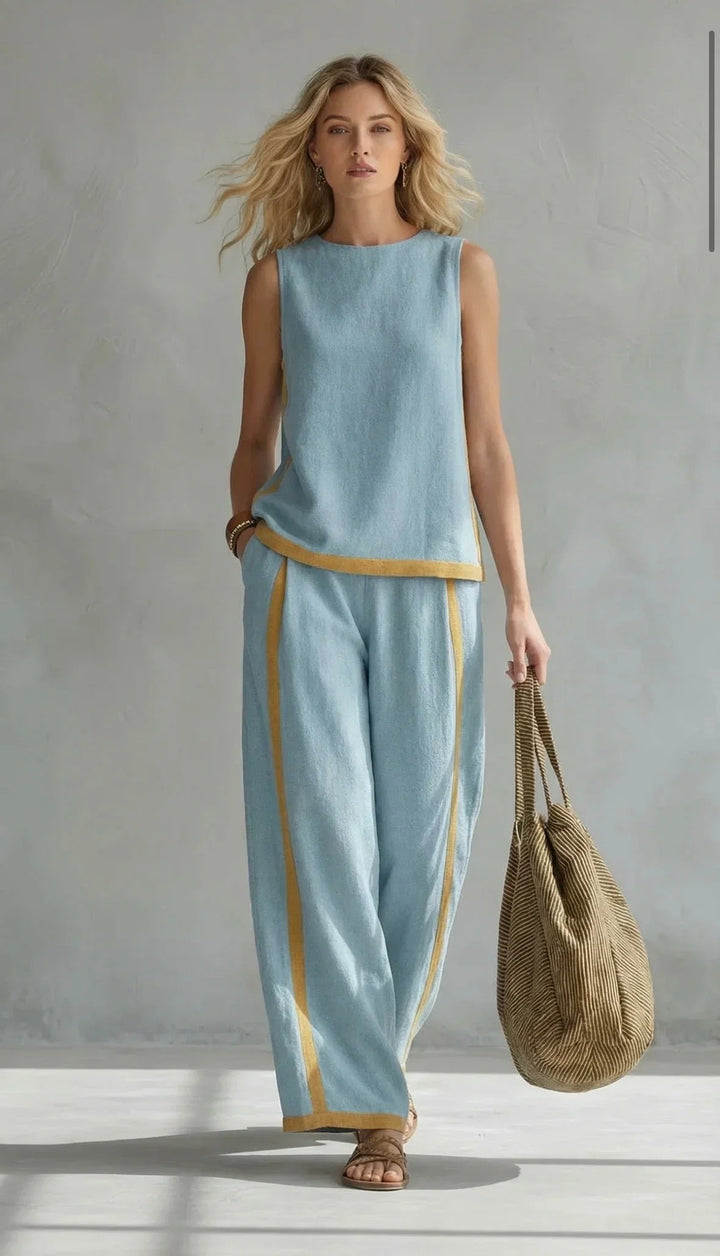 Chic women's contrast-trim sleeveless top & wide-leg pants set. A versatile, elegant two-piece for summer fashion.