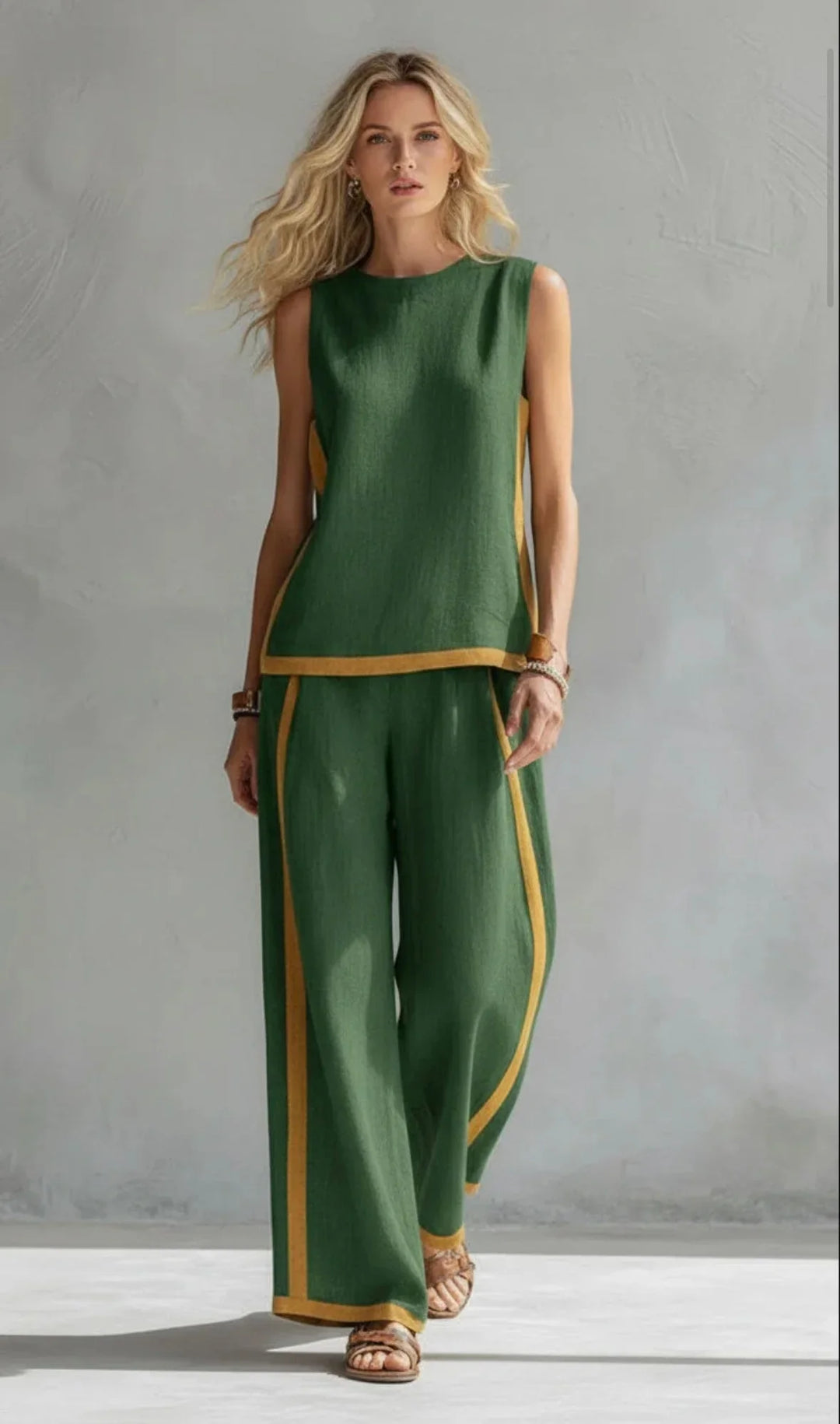 Women's summer style matching set: sleeveless top with contrast trim & wide-leg pants. Casual, comfortable outfit.