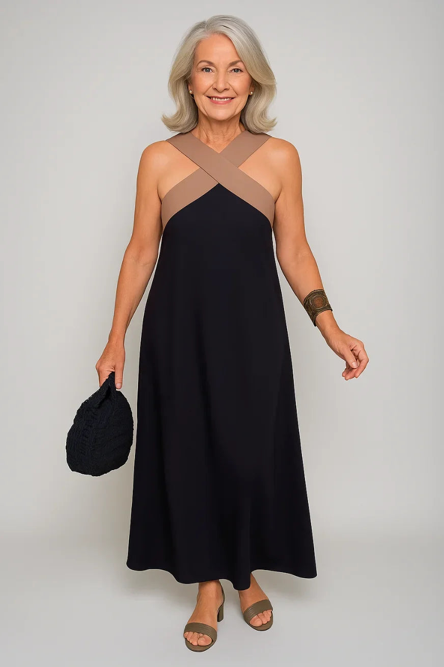 Women's elegant cross-neck sleeveless maxi dress, perfect for summer evenings.