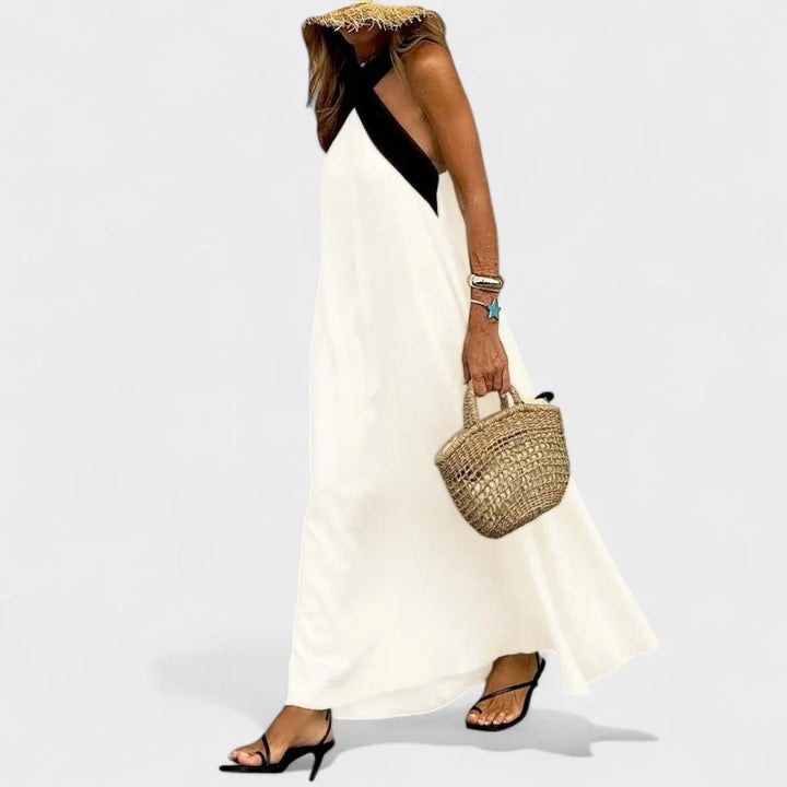 Chic women's cross-neck sleeveless maxi dress, two-tone design, perfect for elegant summer & evening.