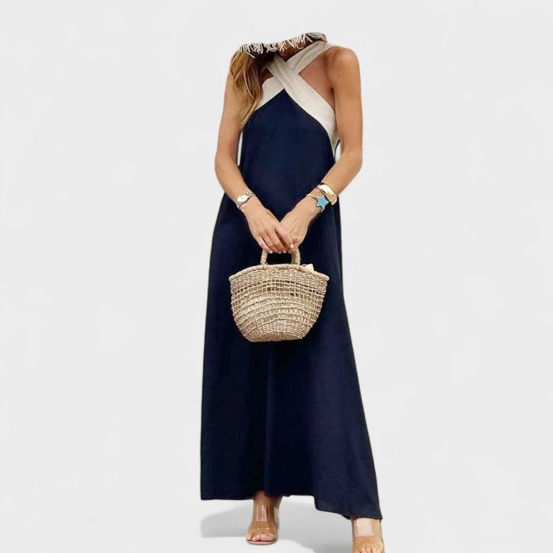 Versatile women's sleeveless maxi dress, cross-neck design for elegant summer & casual wear.