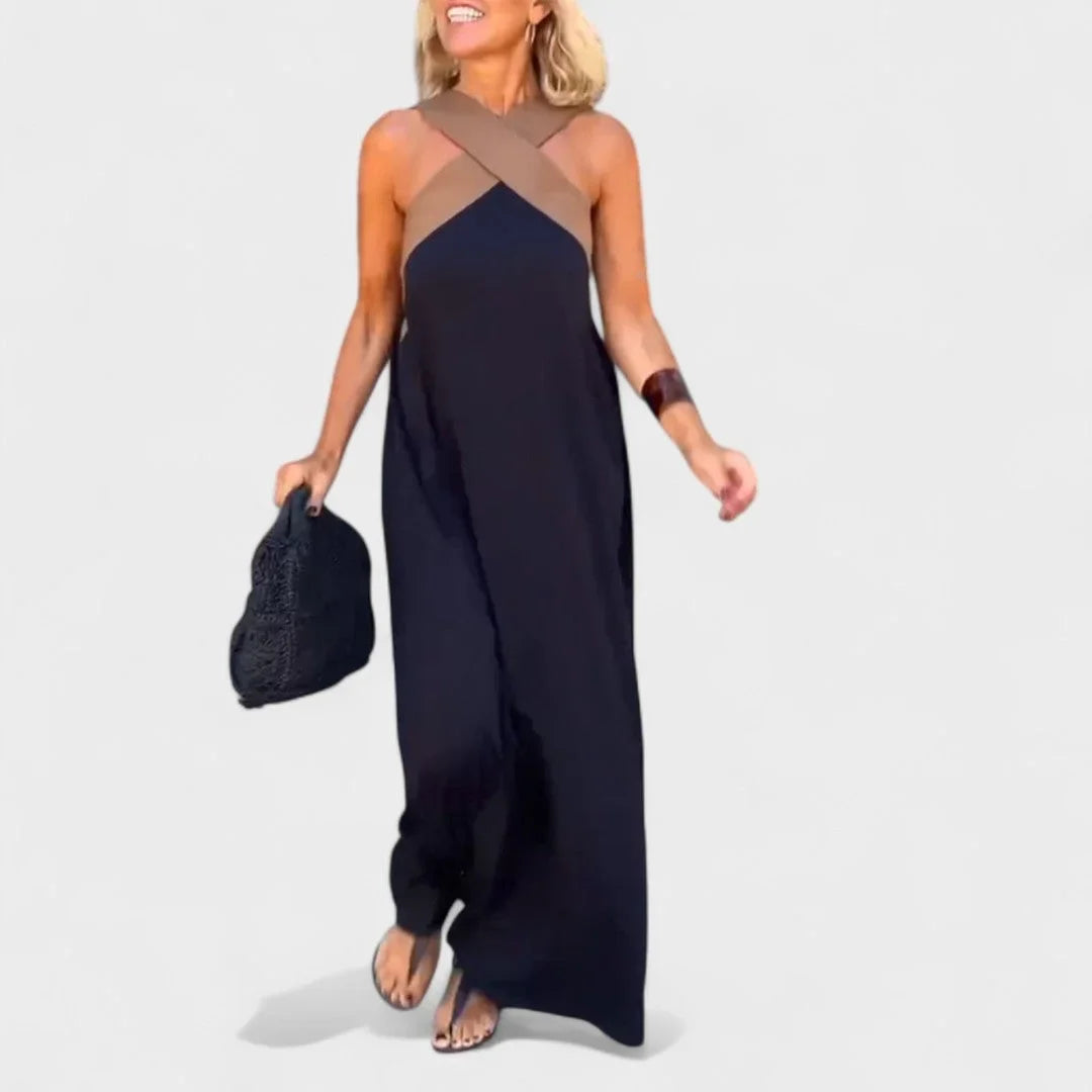 Sophisticated women's elegant cross-neck sleeveless maxi dress, suitable for special occasions.