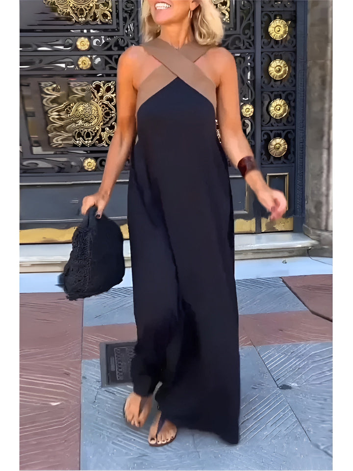 Women's elegant crossed neck summer dress, flowy and comfortable for day or evening wear.