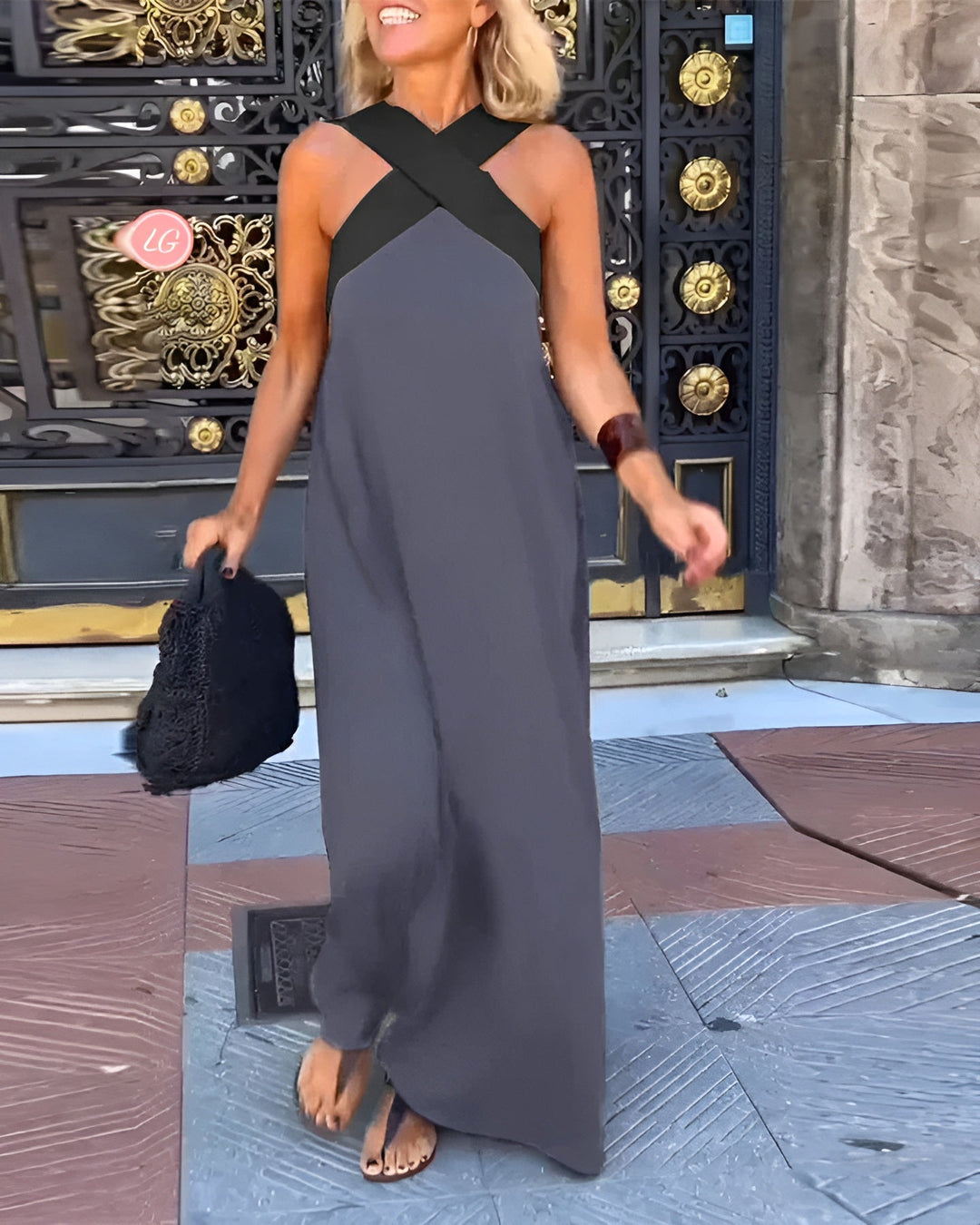 Elegant short summer dress with crossed neck design, ideal for daywear or evening events.