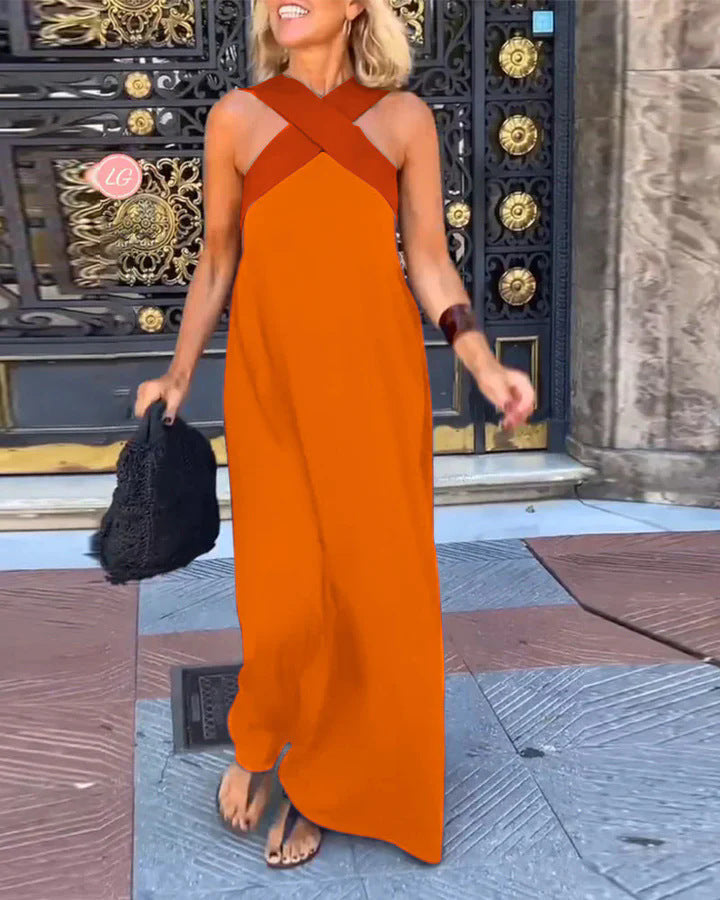 Fashionable women's summer dress, elegant crossed neck style, comfortable for warm weather.