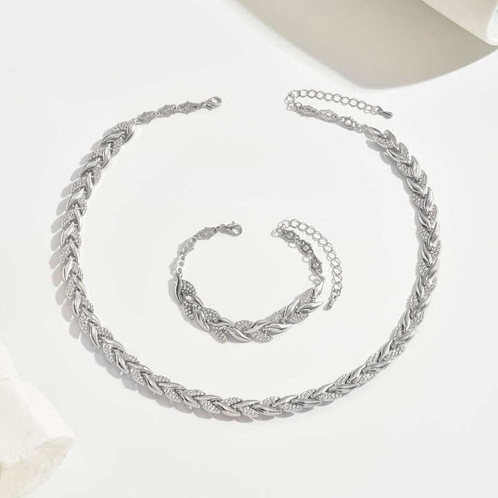 Elegant women's crystal leaf necklace and bracelet set. Sparkling women's jewelry, a thoughtful gift.