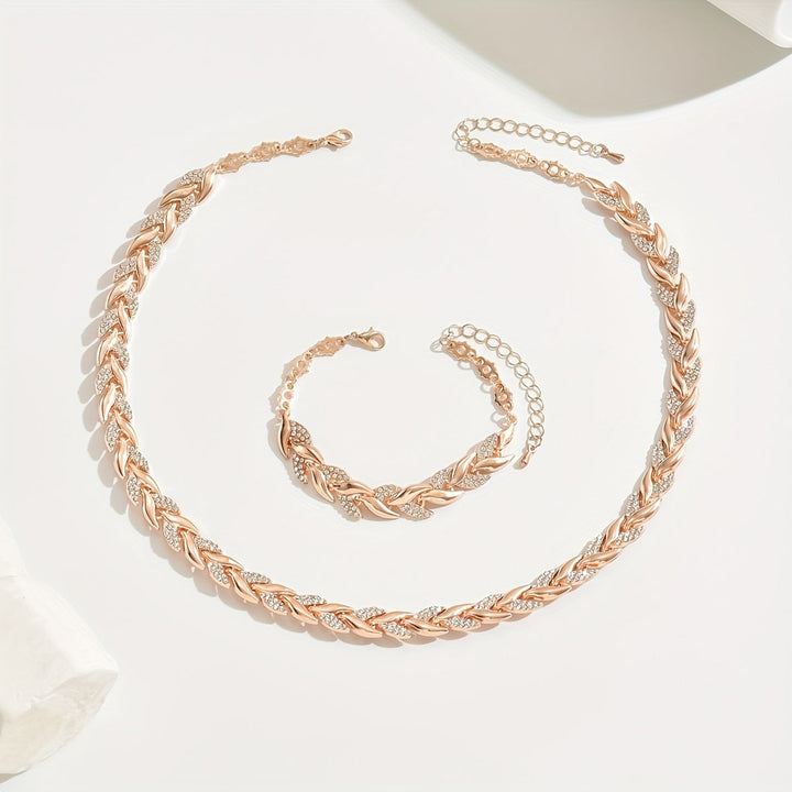 Glimmering crystal leaf women's necklace & bracelet set. Rose gold elegance, perfect sparkling jewelry.