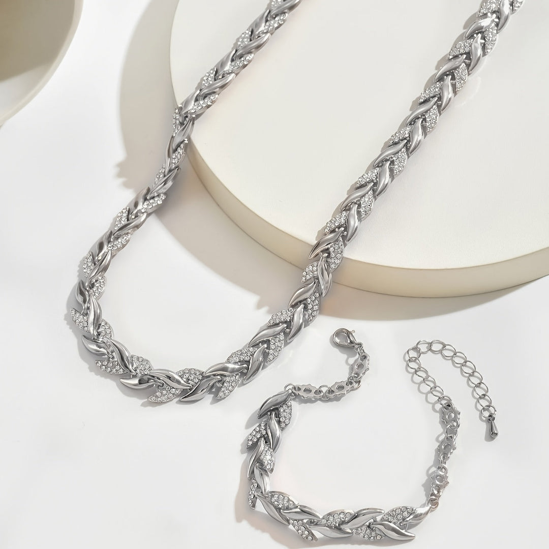 Versatile women's crystal leaf necklace & bracelet set for elegant occasions. Sparkling fashion jewelry.