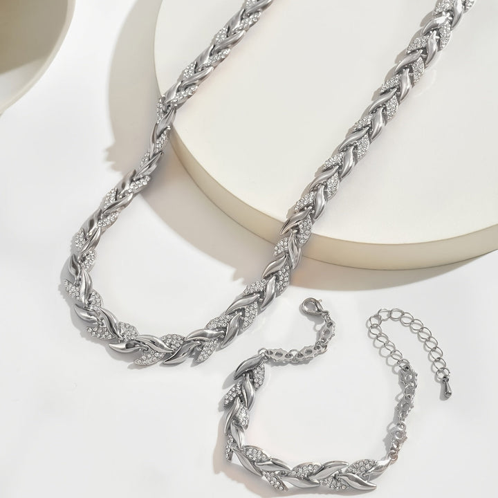 Versatile women's crystal leaf necklace & bracelet set for elegant occasions. Sparkling fashion jewelry.