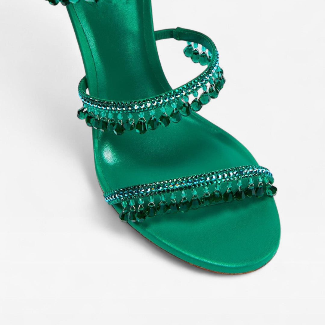 Glamorous women's high heel sandals featuring crystal straps for a dazzling evening style.