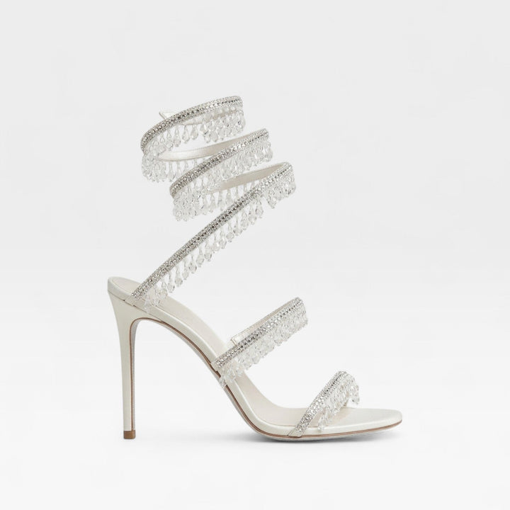 Luxurious embellished crystal high heels, perfect strappy sandals for wedding guests.