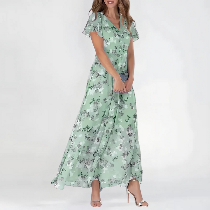 Vibrant daisy floral dress for women, an elegant and flattering summer style, perfect for casual or party occasions.