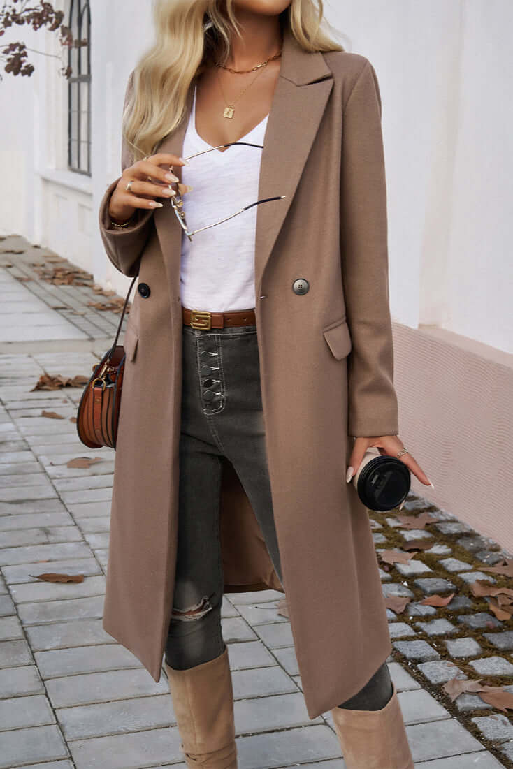Elegant women's winter long coat, double-breasted, offering ultimate style and warmth.