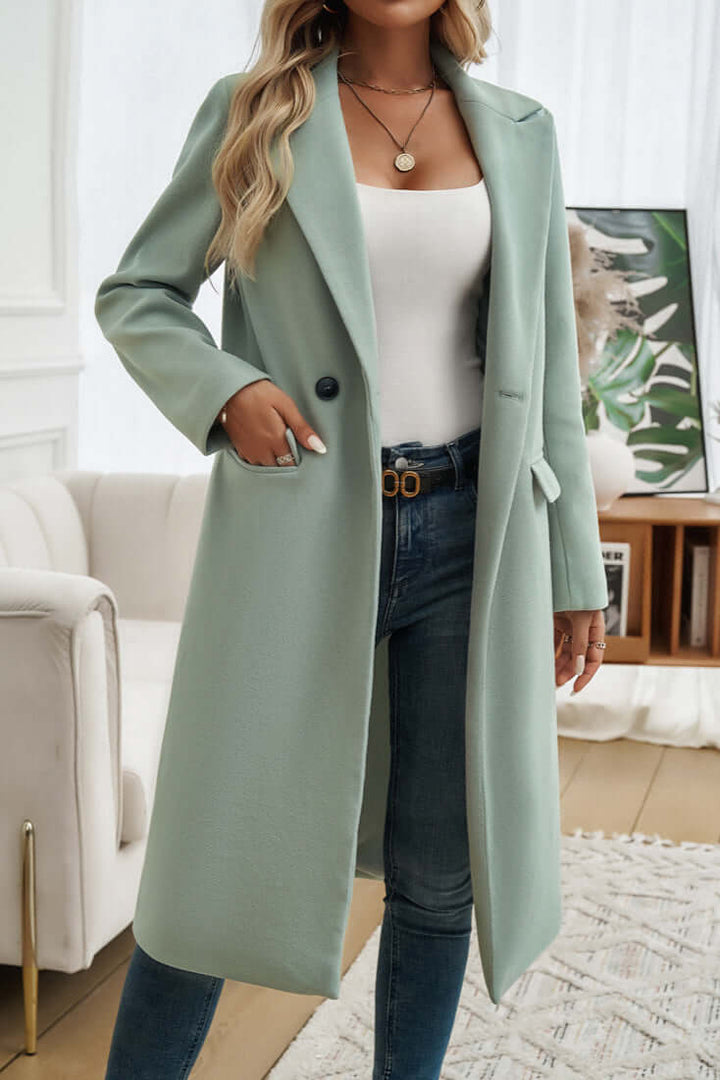 Women's elegant double-breasted long coat, versatile for both casual and formal occasions.