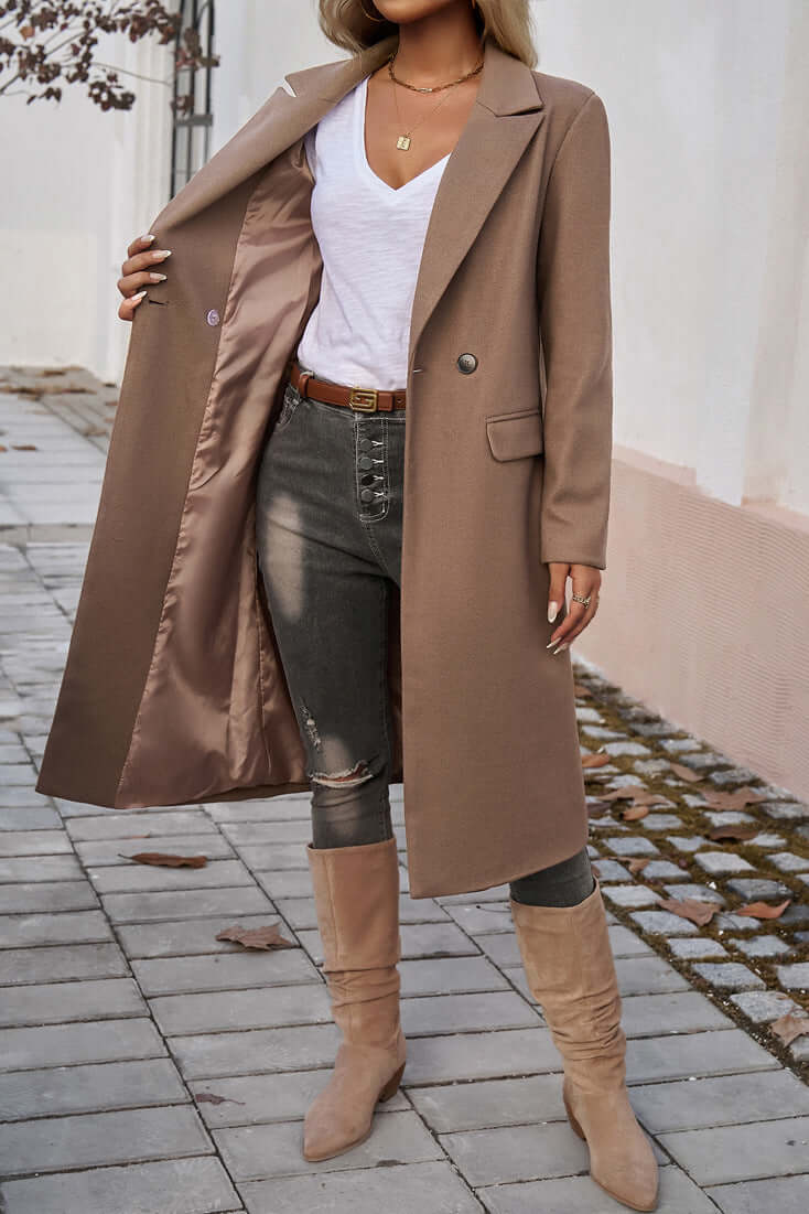 Women's elegant long double-breasted coat, perfect for a refined winter outfit or occasion.