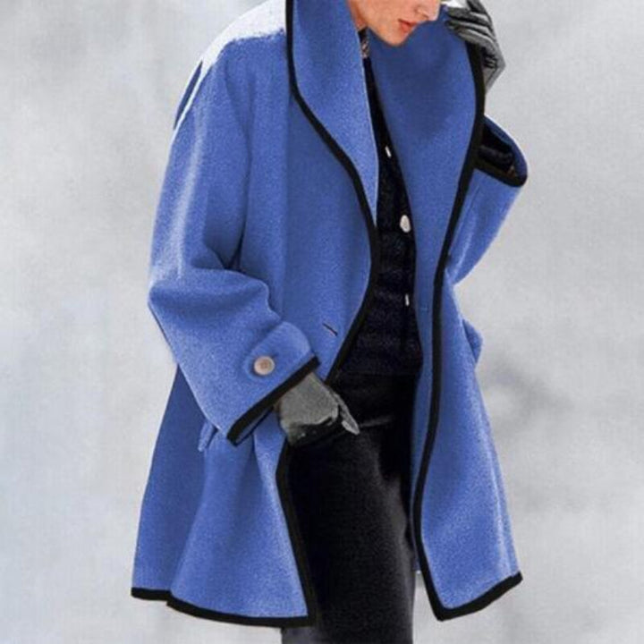 Stylish double-breasted long trench coat for women, ideal winter outerwear and ladies' fashion.