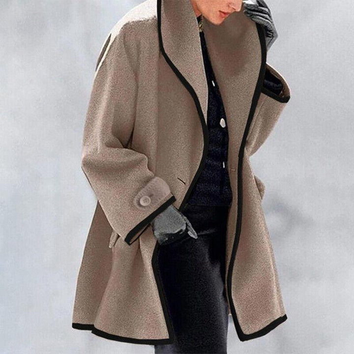 Chic women's winter trench coat with double buttons, versatile for elegant formal or casual wear.