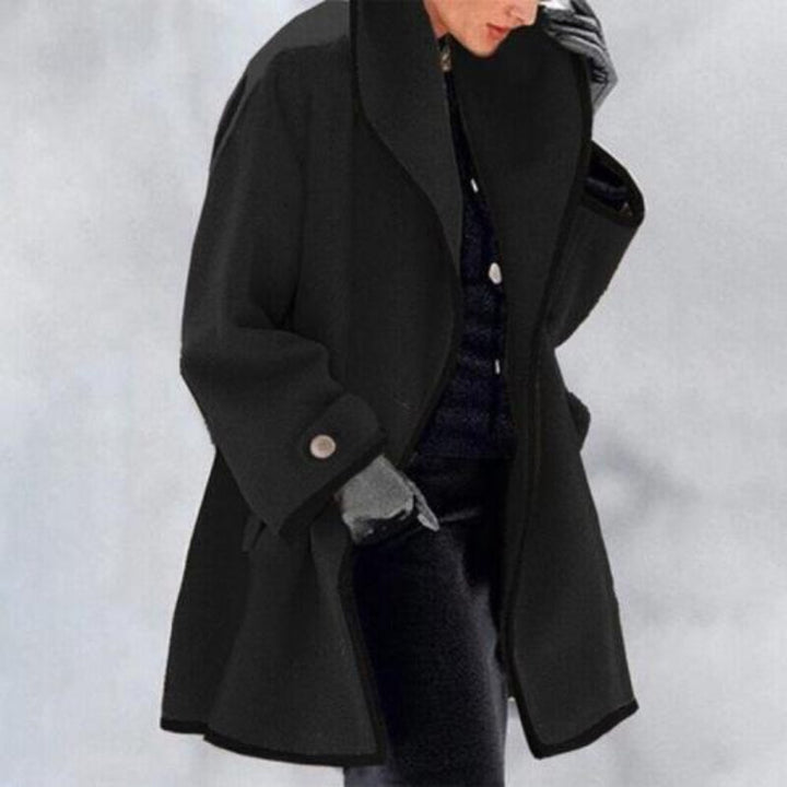 Warm women's double button trench coat, essential long winter jacket for cold weather elegance.