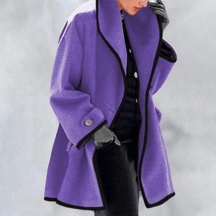 Sophisticated double-breasted women's winter coat, ideal cold weather outerwear for an elegant look.