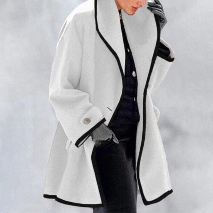 Women's long double button trench coat, offering warmth and style for winter and formal wear.