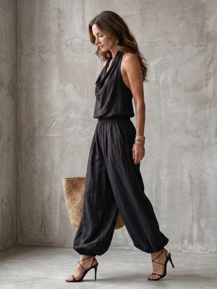 Elegant women's two-piece set featuring a drape neck top & wide leg trousers. Ideal for summer outfits, casual chic.