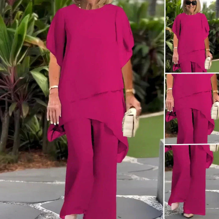 Modern women's two-piece set featuring draped palazzo pants and a sleek, fashionable top.