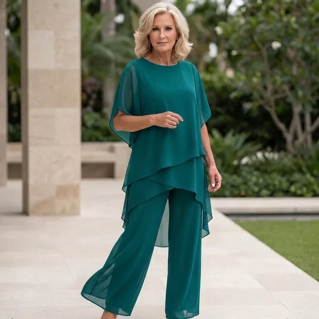 Refined women's elegant set: sophisticated draped palazzo pants and a matching chic top.