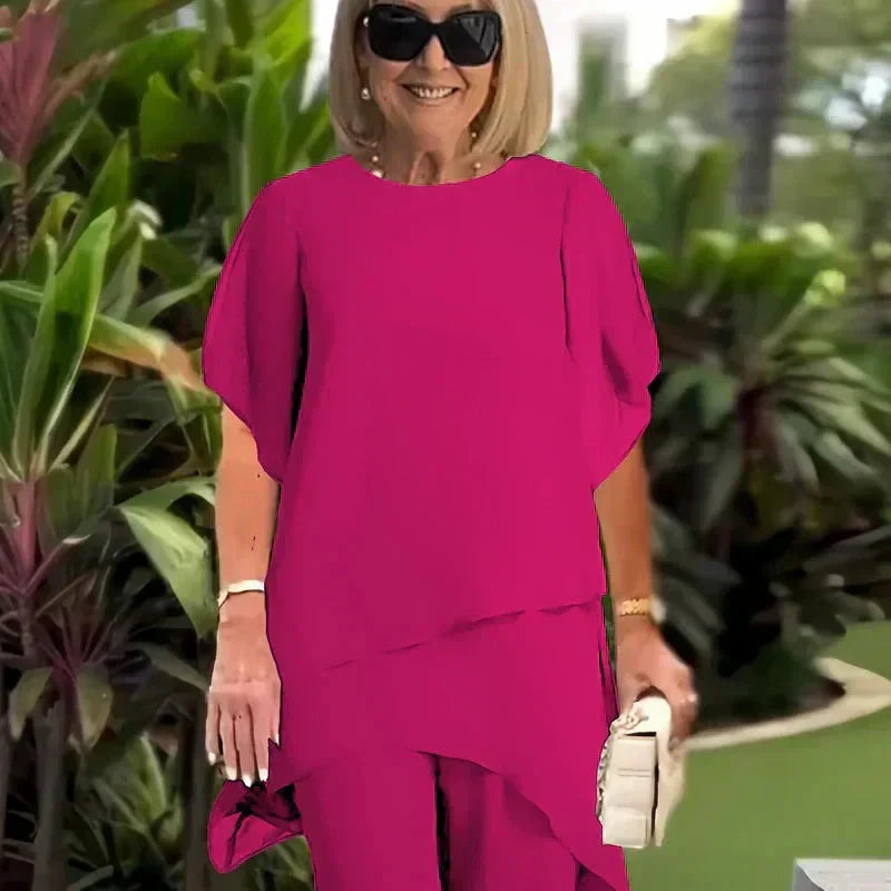 Casual chic women's outfit: a comfortable draped palazzo pants and elegant top set.