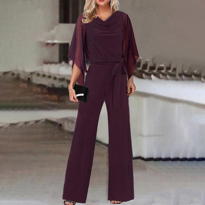 Chic wide leg jumpsuit for women with a sophisticated wide neckline and flowing sleeves.