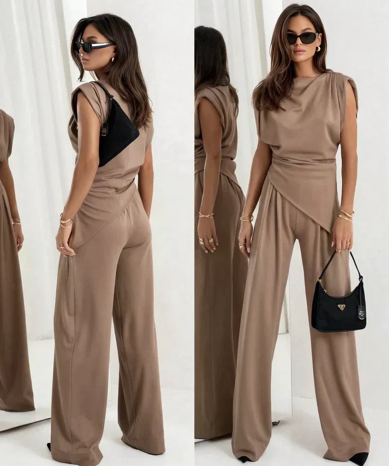 Comfortable women's two-piece set featuring a sleeveless draped top & relaxed wide-leg trousers.
