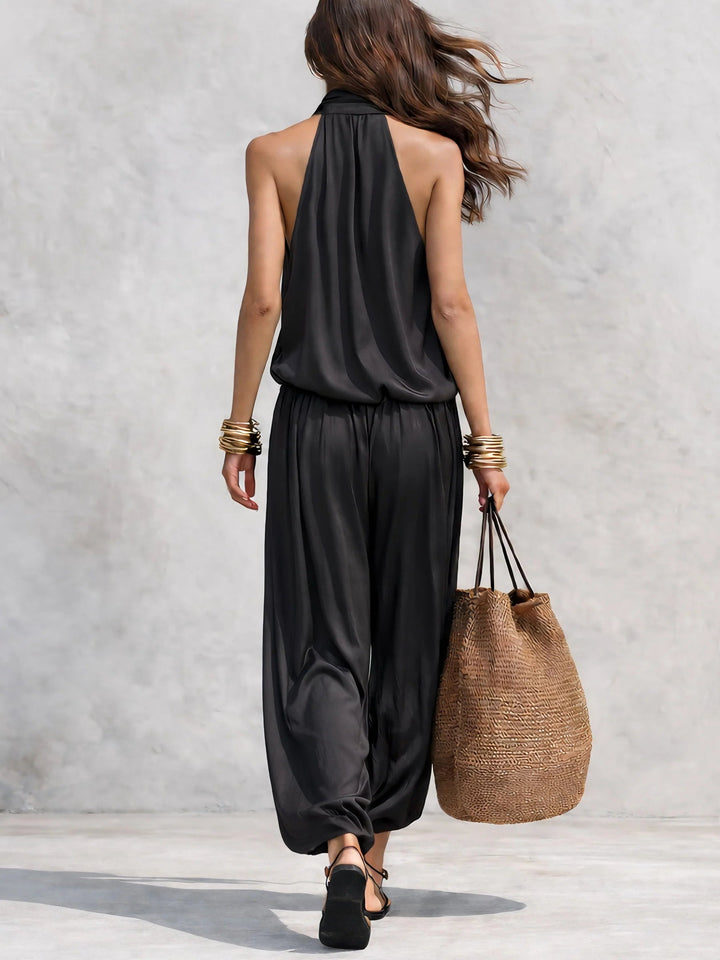 Elegant women's two-piece set featuring a comfortable draped cowl neck top and chic wide-leg trousers for summer.