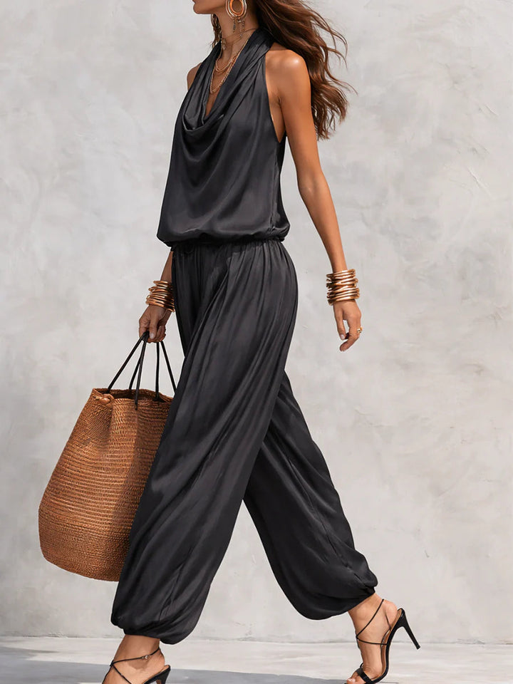 Stylish women's draped two-piece set; soft cowl neck top paired with flowing wide-leg trousers. Comfortable & elegant.
